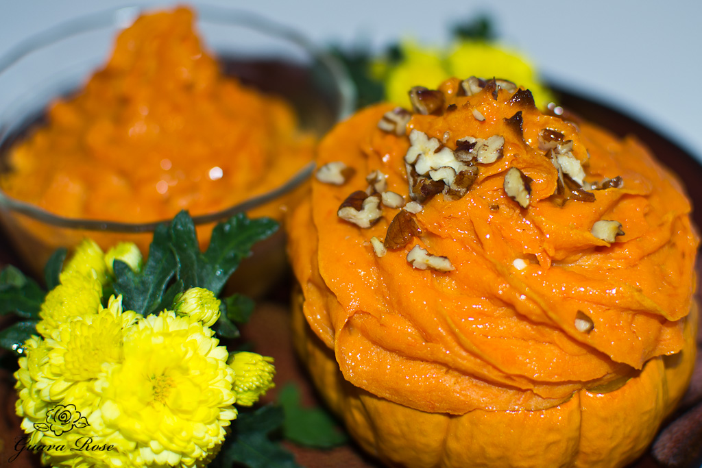 Maple vanilla sweet potatoes in mini pumpkin with pecans, and baked in glass cup