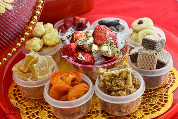 Chinese candy holder, with clear cups filled, side view