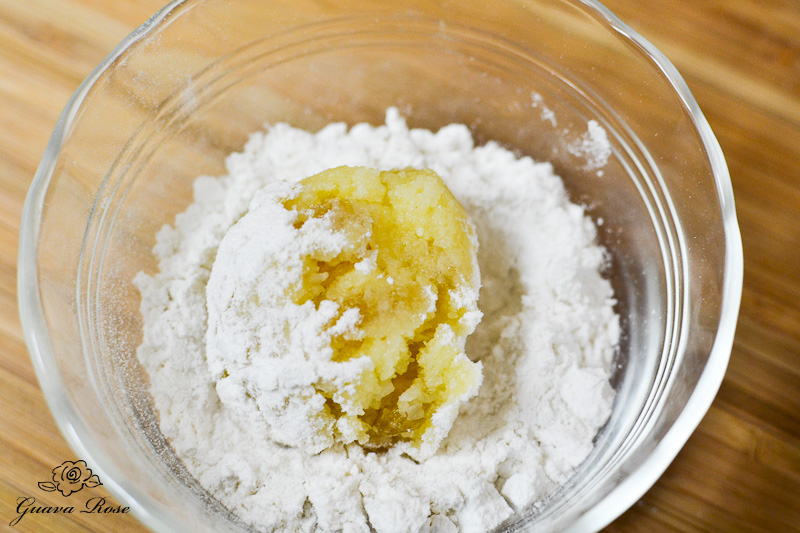 Scoop of dough in flour