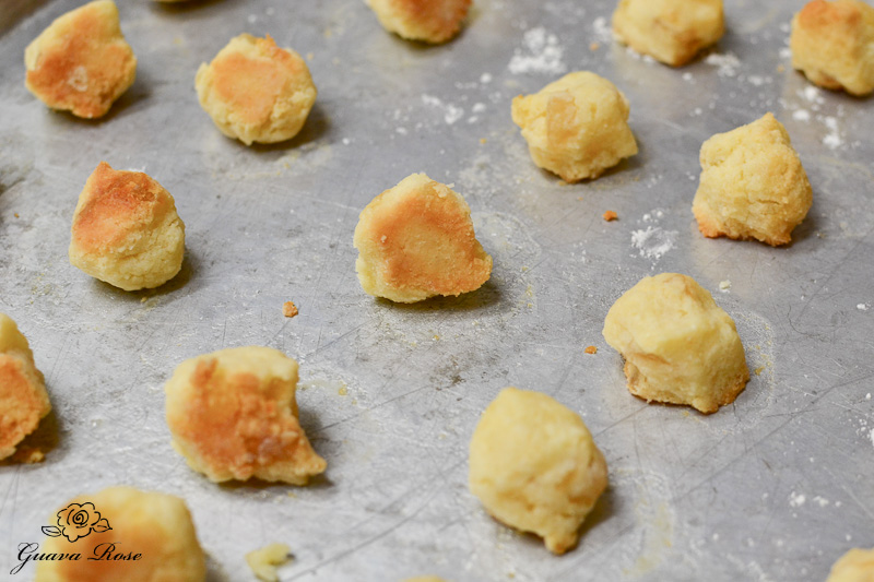 Coconut pineapple macaroons on sheet baked, and turned over