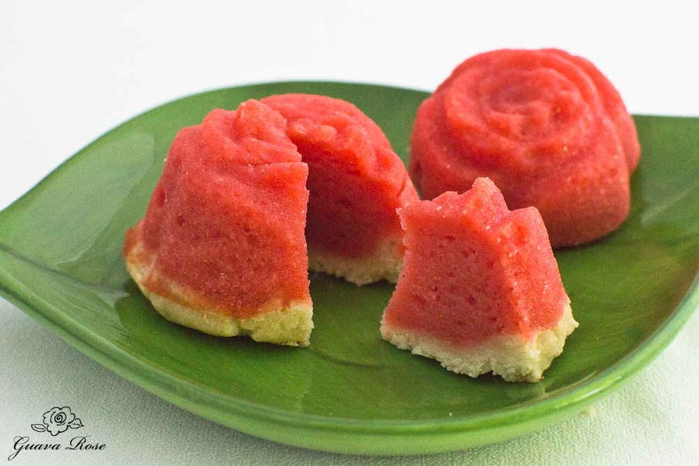 Guava rose mochi tarts on leaf plate, cut wedge