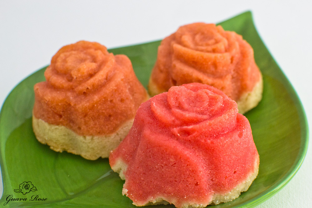 Guava rose mochi tarts on leaf plate, frontview closeup