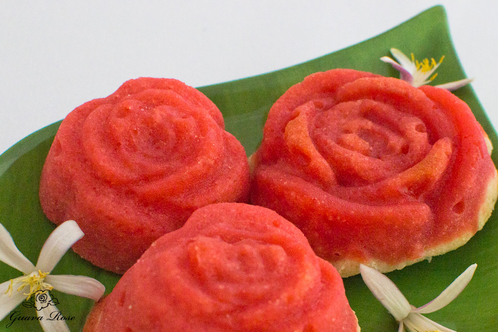 guava rose mochi tarts on leaf plate, with flowers