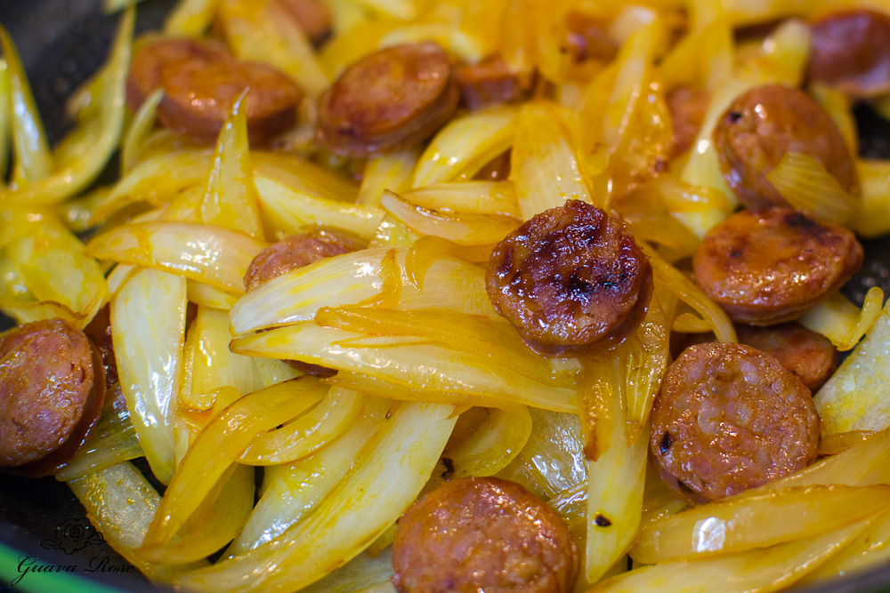 Portuguese sasage sauteed with sweet yellow onions