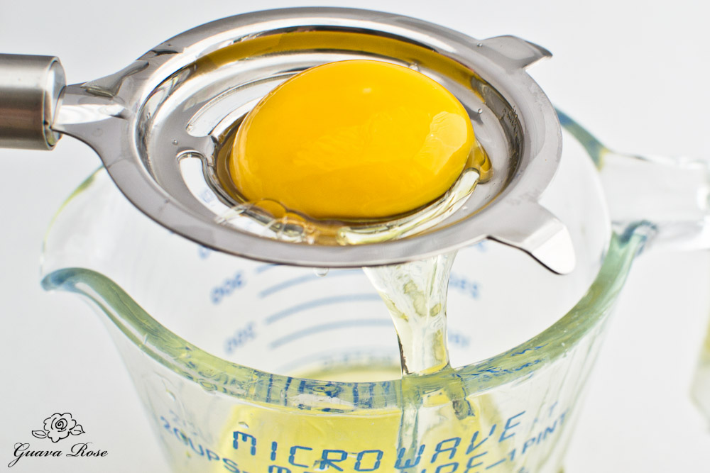 Single egg yolk on egg separator
