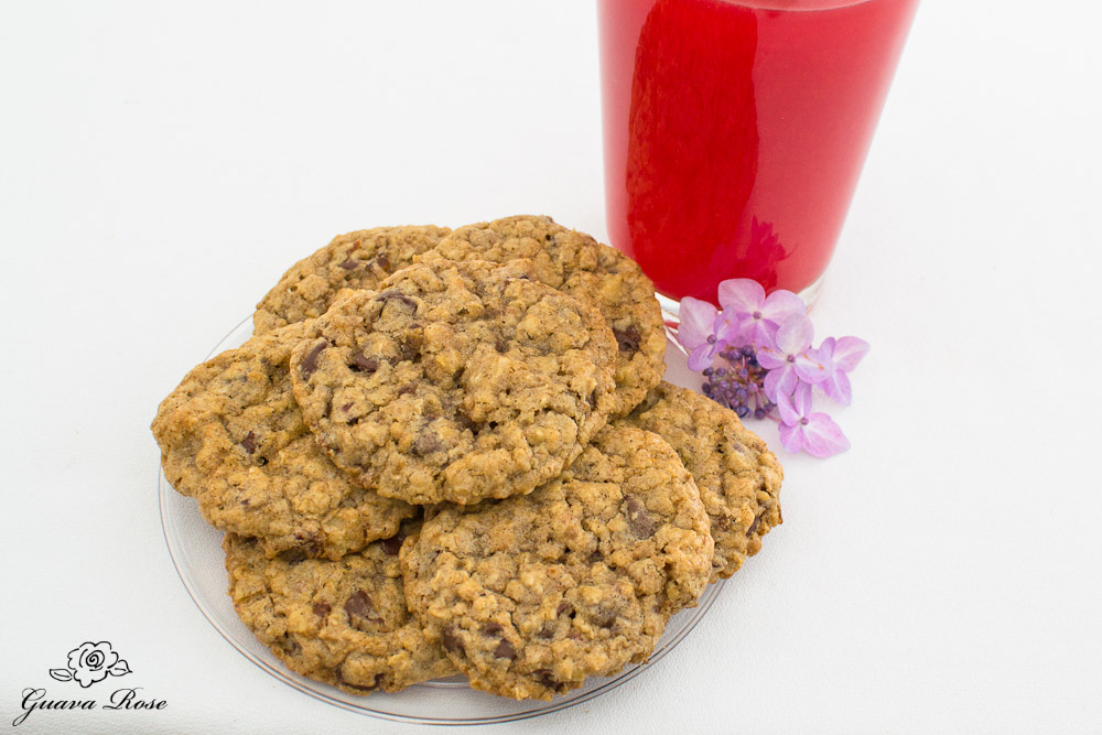 % spice walnut date choc chip cookies & partial view of glass