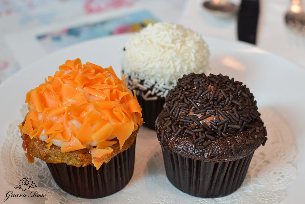 Mini carrot, white, and  fudge cupcakes