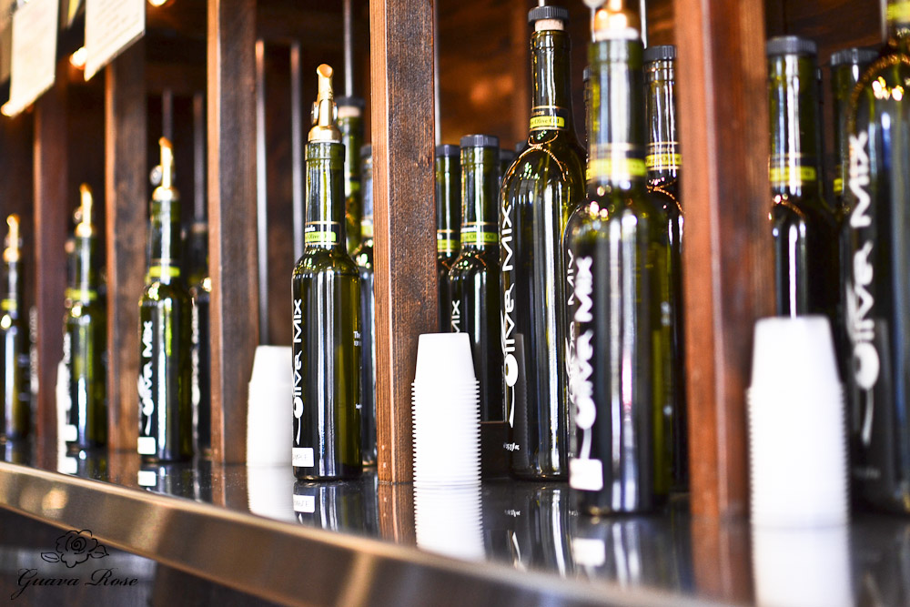 Olive oil sample bottles and tasting cups
