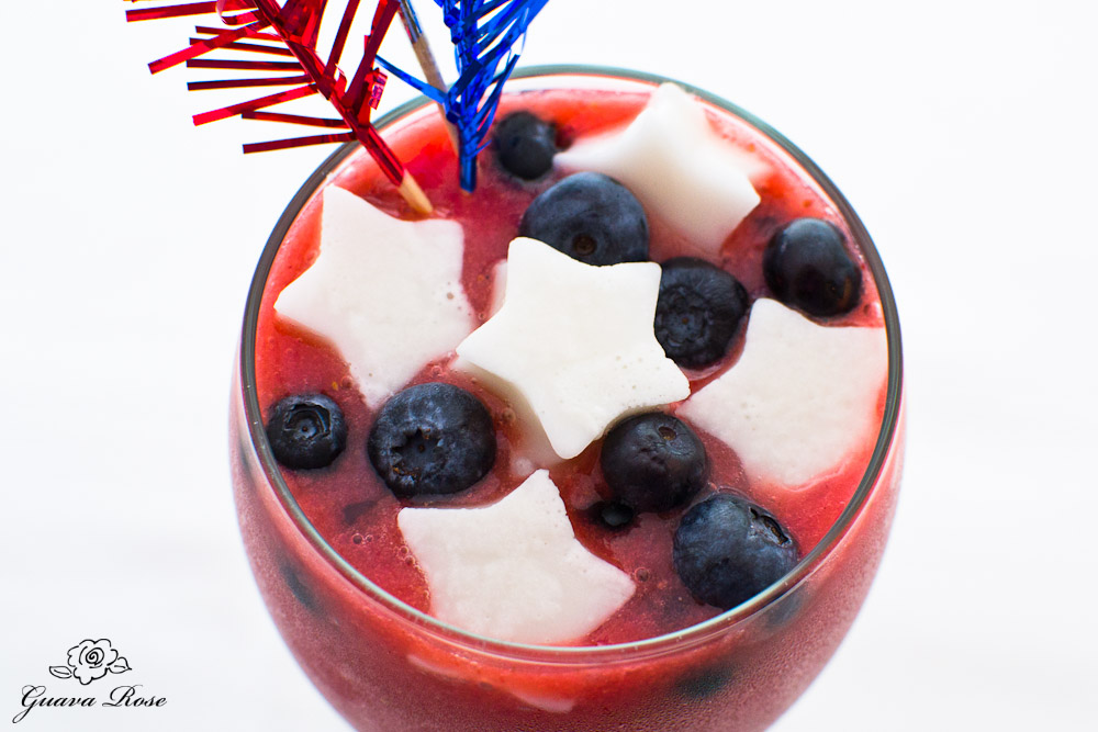 Strawberry Watermelon Smoothie with Blueberries and Haupia Jello Stars, with red/silver/blue frilly picks (cool down)