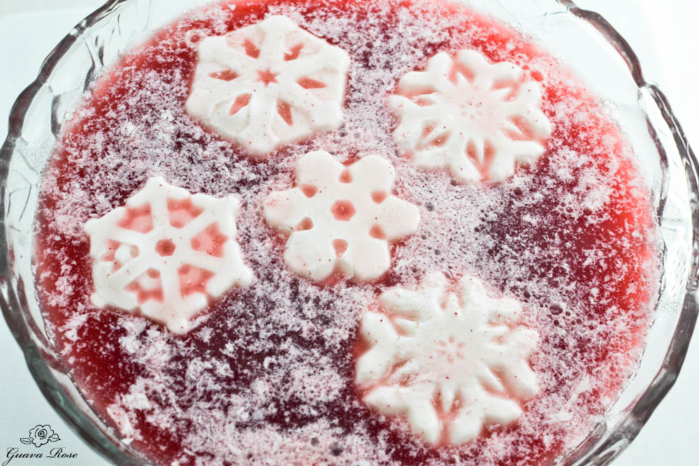 Coconut milk snowflakes starting to melt in punch