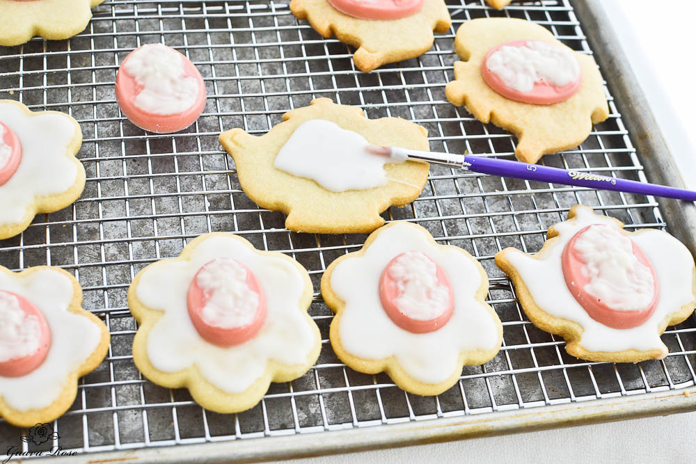 Painting icing on cookies