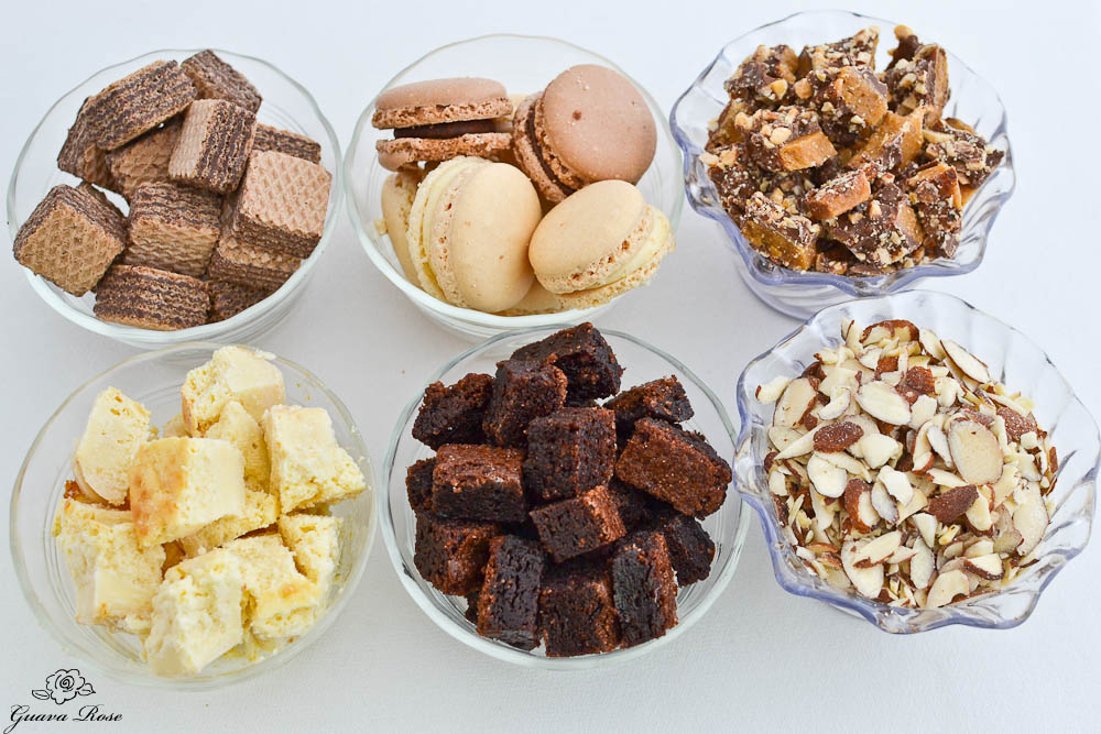 wafer cookies, macarons, toffee, frozen cheesecake and brownie bites, sliced almonds in cups
