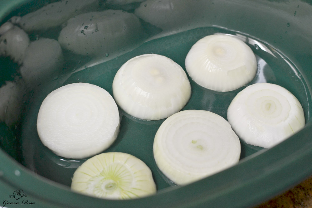 Rack of onions in crockpot